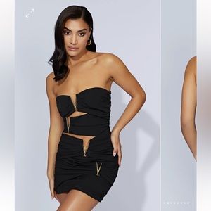 MESHKI black mini dress with V metal hardware. Very flattering. Size M.